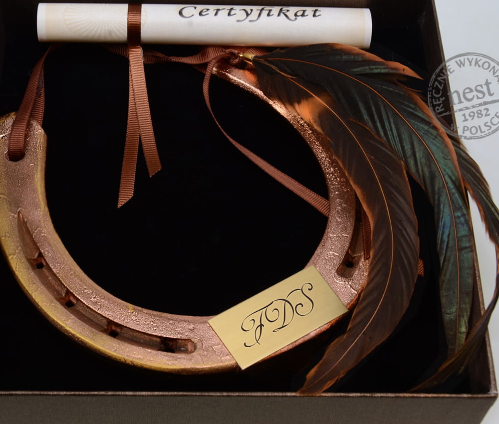 Podkowa miedziana z piórami